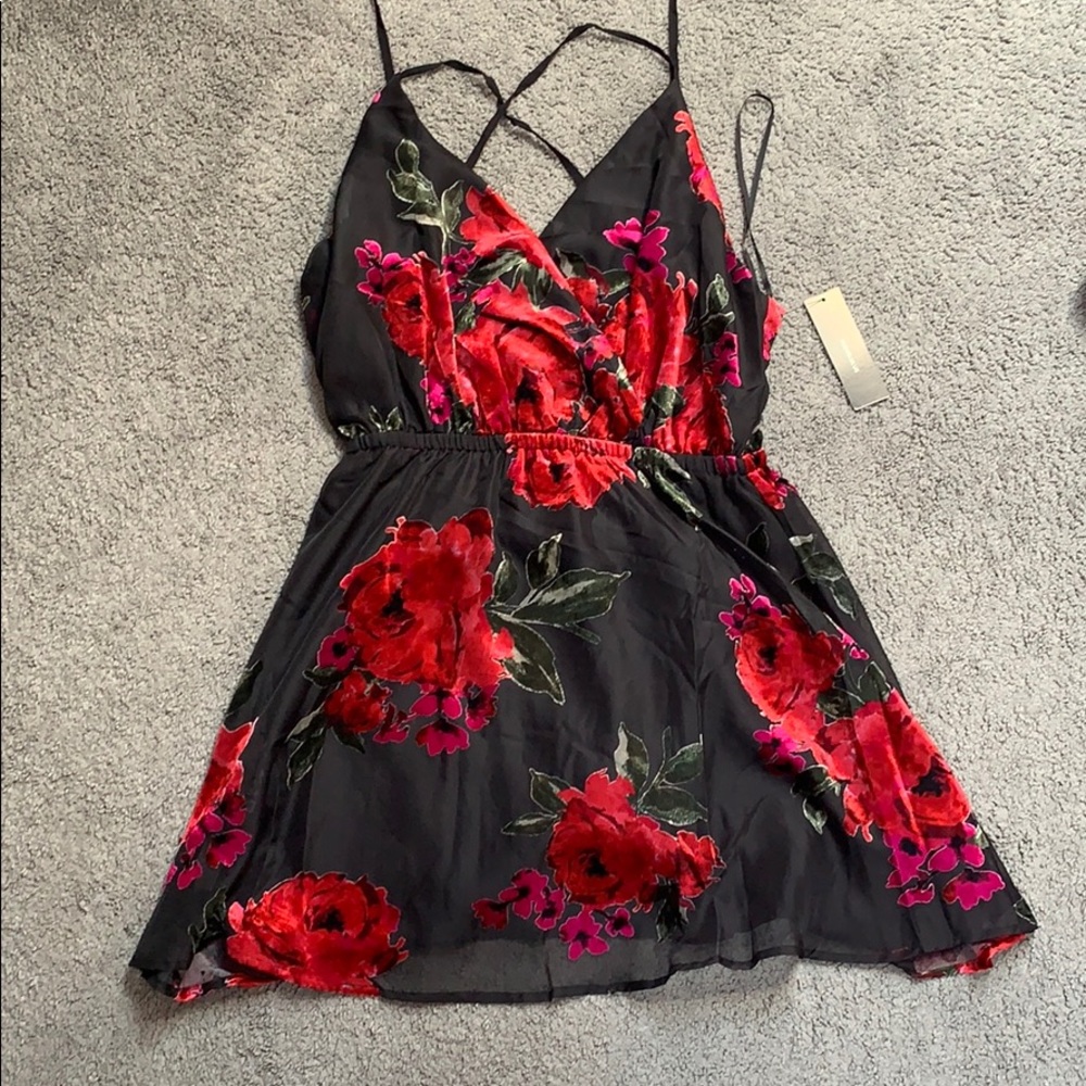 Black mini dress with velvet red flower design